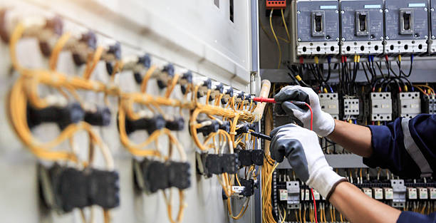 Professional Electrician technician working in Oak Park Heights, MN
